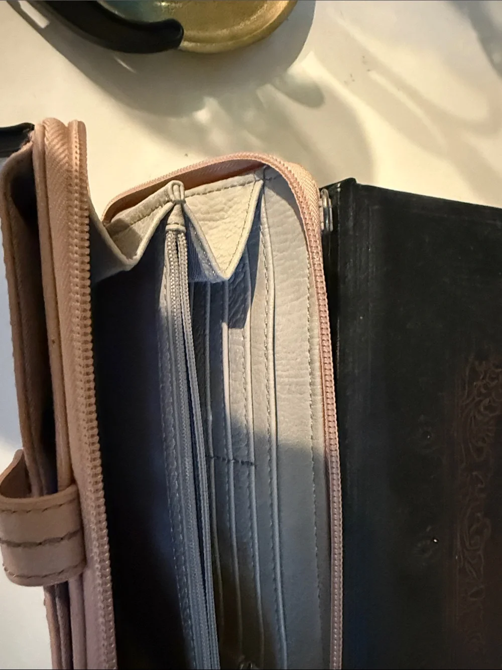 The Sak Pebbled Wristlet Phone Case in Blush Pink